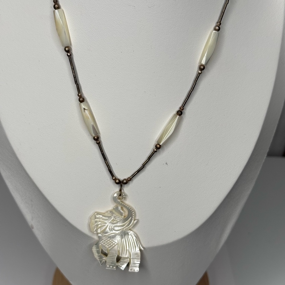 Carved Elephant Pendant Necklace